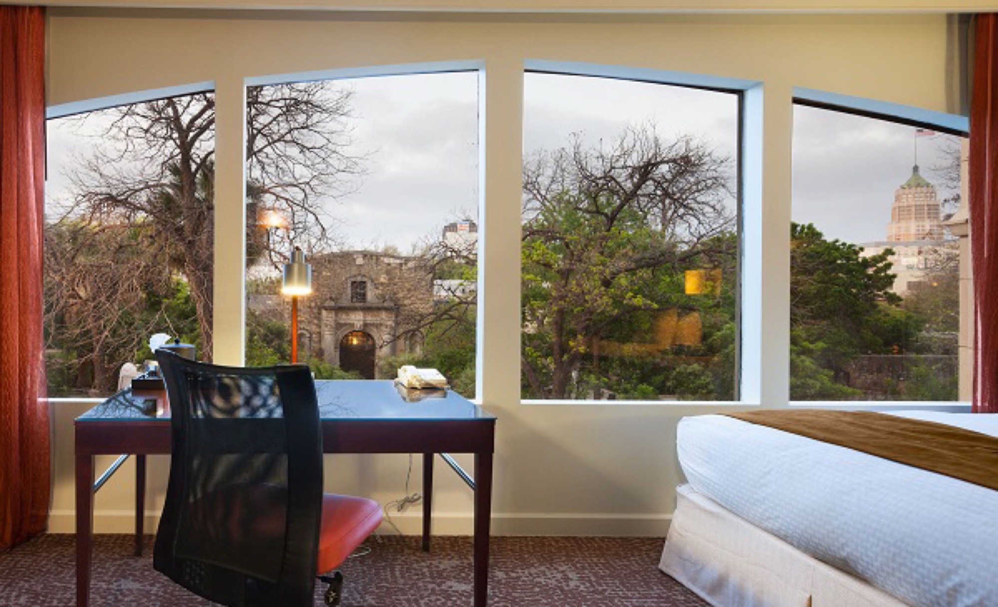 Guest room with windows overlooking the Alamo